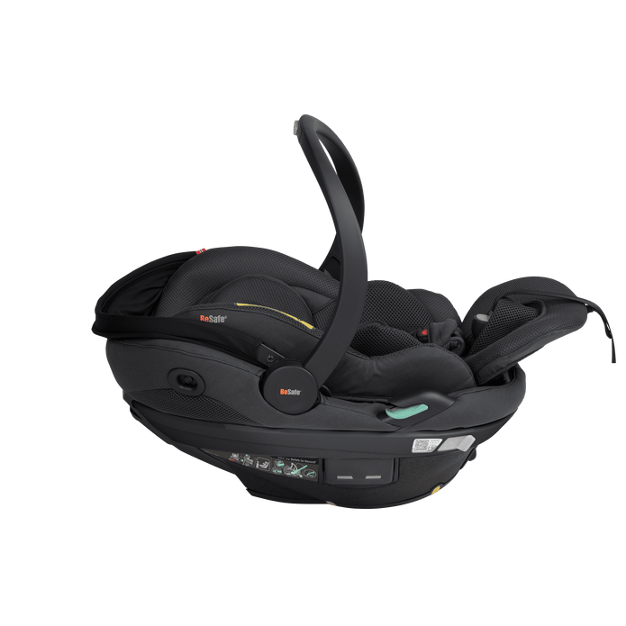 Black baby car seat on a transparent background