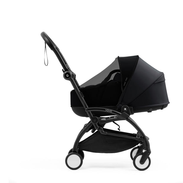 Stokke YOYO Bassinet Mesh Cover fitted tightly over a Black Yoyo5 bassinet - Available from Parent Studio