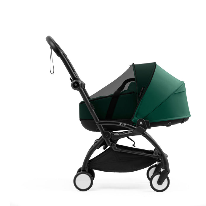 Stokke YOYO Bassinet Mesh Cover fitted tightly over a Forest Green Yoyo5 bassinet - Available from Parent Studio