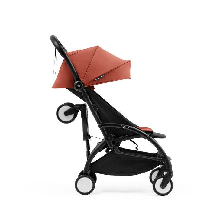 Stokke Yoyo Board folded behind a Berry Yoyo5 Stroller - Available from Parent Studio