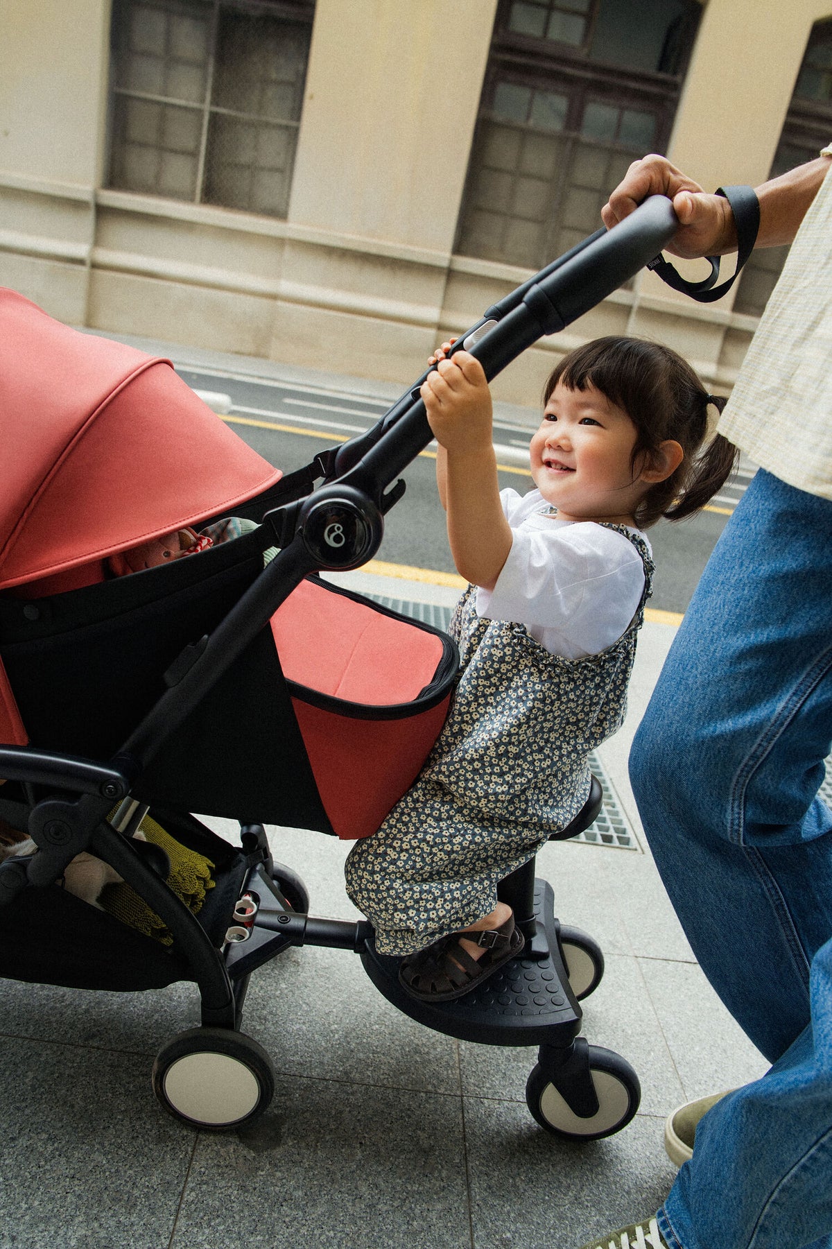 Side Profile lifestyle image of Stokke Yoyo Board toddler sibling solution for Yoyo Stroller - Available from Parent Studio