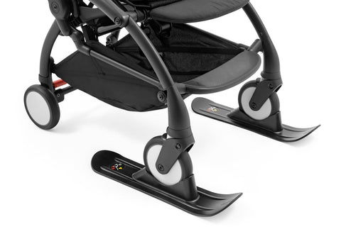Stokke YOYO skis in black attached to the front wheels of a stroller frame - Available from Parent Studio