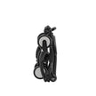 Side view of the ultra-compact Stokke YOYO5 base frame in its fully folded standing position - Available from Parent Studio.