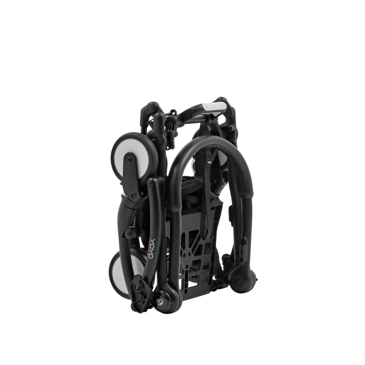 Three-quarter angled perspective of the folded Stokke YOYO5 chassis showing its cabin-approved compact footprint - Available from Parent Studio