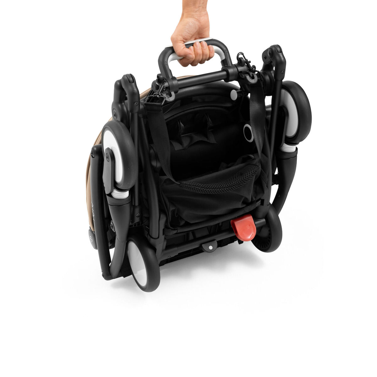Angled perspective of the folded Stokke YOYO5 chassis showing its sleek new handle for hand carrying - Available from Parent Studio
