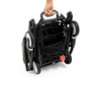 Angled perspective of the folded Stokke YOYO5 chassis showing its sleek new handle for hand carrying - Available from Parent Studio