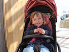Stokke YOYO toddler bumper bar on Berry YOYO5 stroller in lifestyle image- Available from Parent Studio