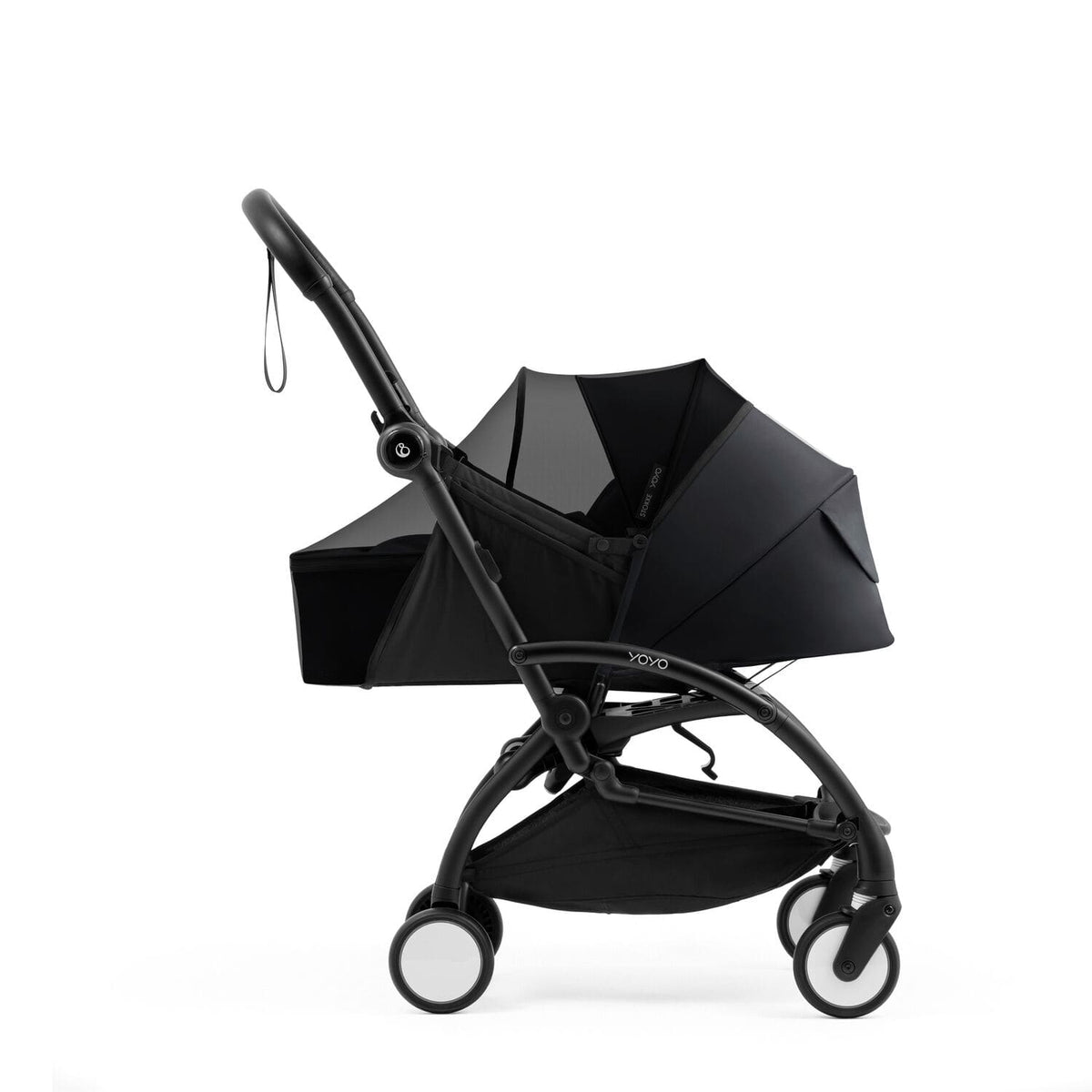 Stokke YOYO newborn pack in Black fitted with the protective mesh insect cover - Available from Parent Studio