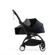 Stokke YOYO newborn pack in Black fitted with the protective mesh insect cover - Available from Parent Studio