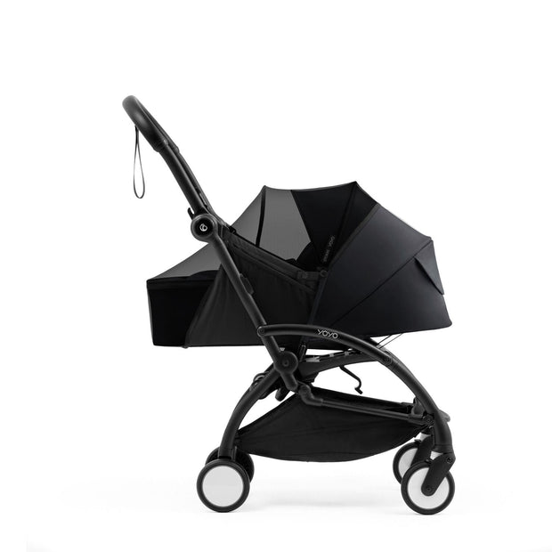 Stokke YOYO newborn pack in Black fitted with the protective mesh insect cover - Available from Parent Studio