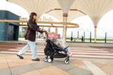 Transparent weather cover secured over a Berry Stokke YOYO5 toddler seat - Available from Parent Studio