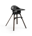 Black high chair with wooden legs on a white background