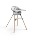 Children's high chair with gray seat and wooden legs on a white background