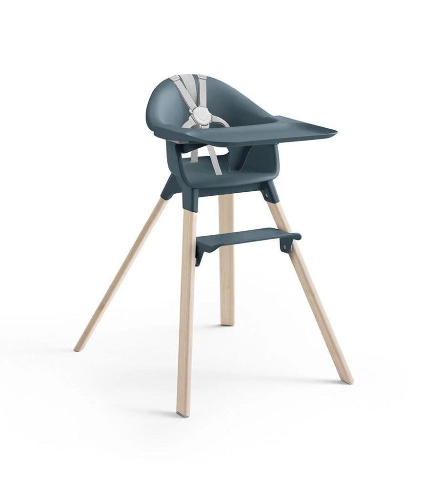 Blue high chair with wooden legs on a white background