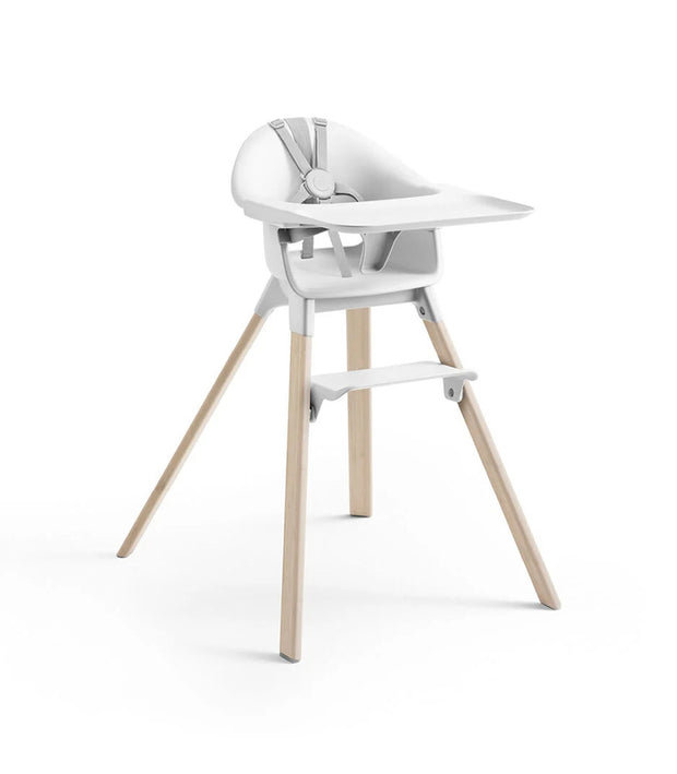 Modern high chair with white seat and wooden legs on a white background