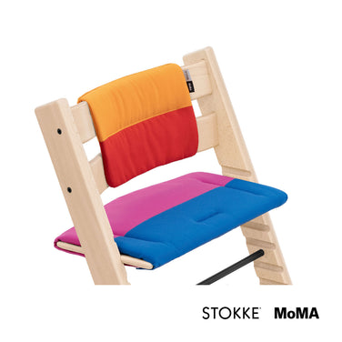 Side profile close-up of the Stokke Tripp Trapp Cushion MoMA Edition fitted on a Tripp Trapp chair, available from Parent Studio.