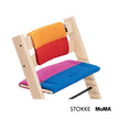 Side profile close-up of the Stokke Tripp Trapp Cushion MoMA Edition fitted on a Tripp Trapp chair, available from Parent Studio.