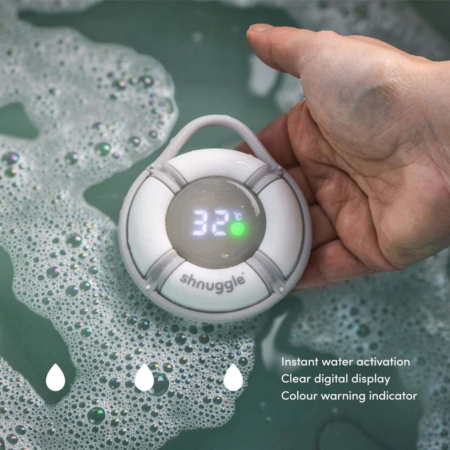 Shnuggle Bobbin Buoy baby bath instant thermometer showing green safety light for optimal 32 to 37 degree bath water — Available from Parent Studio.