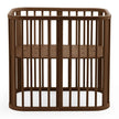 Stokke Nighti mini cot in warm brown finish  — Available from Parent Studio