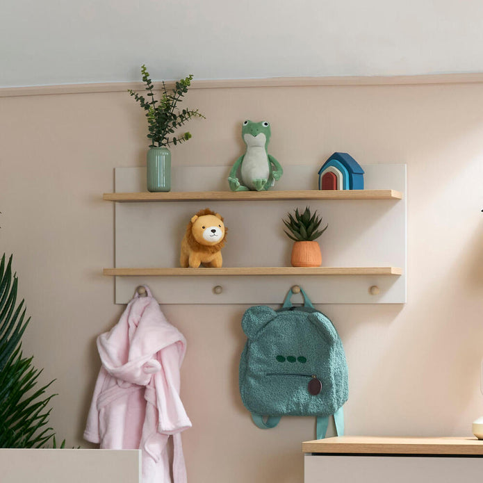 Shelves with decorative items including a backpack, towel, and small figurines in a room setting.