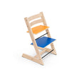 Side profile of the Stokke Tripp Trapp Chair MoMA Edition showing 1 of 4 reversible multi-colour plates combinations, available from Parent Studio.