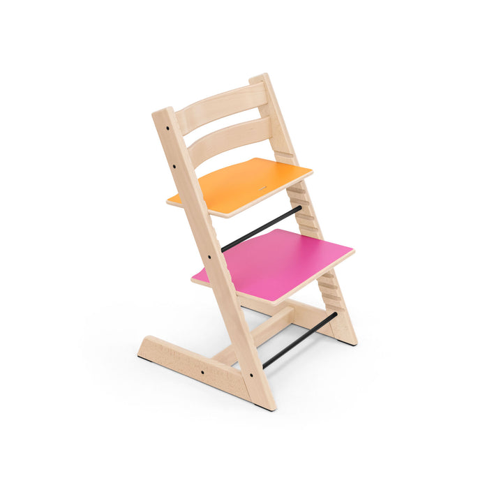 Side profile of the Stokke Tripp Trapp Chair MoMA Edition showing 1 of 4 reversible multi-colour plates combinations, available from Parent Studio.
