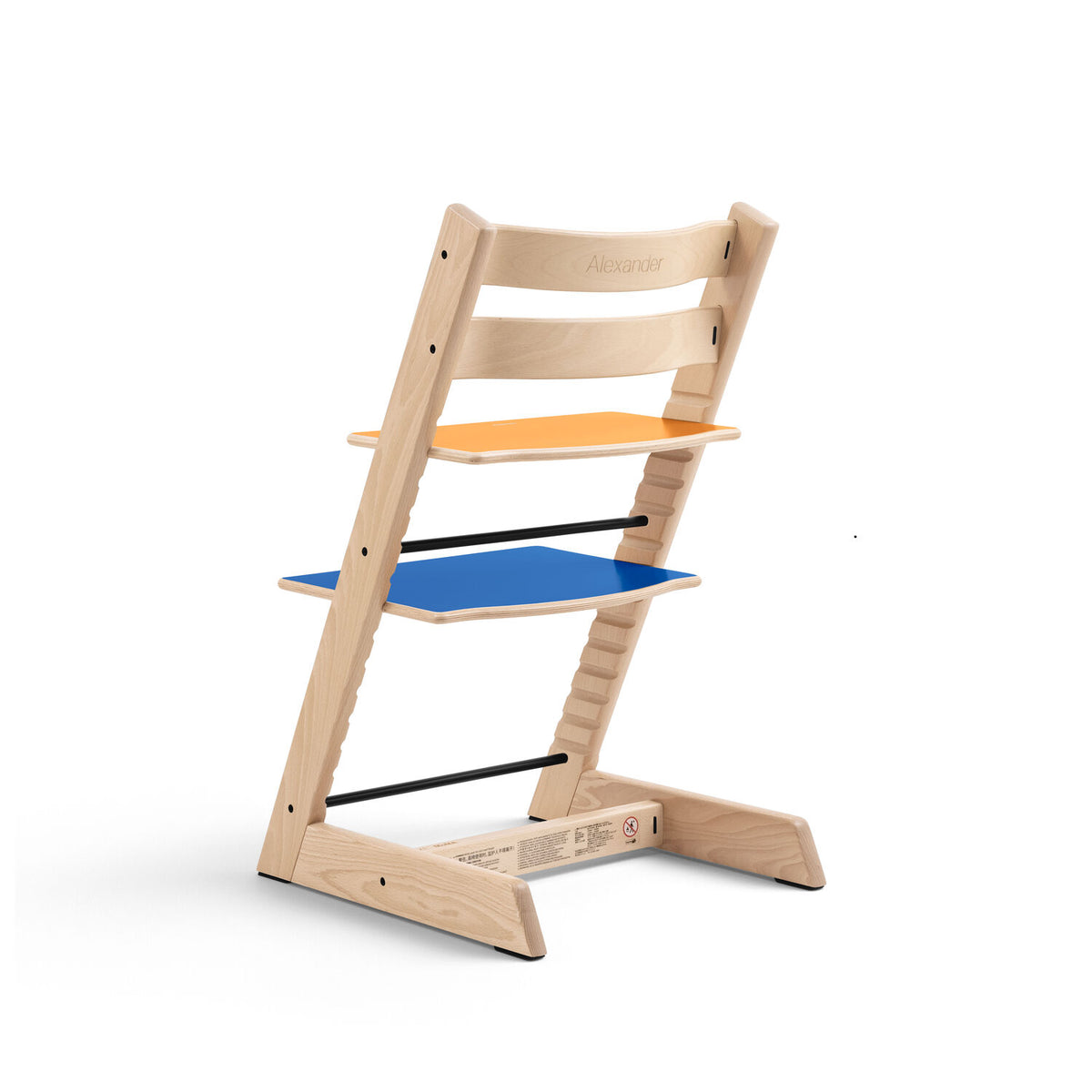 Rear side profile of the Stokke Tripp Trapp Chair MoMA Edition showing 1 of 4 reversible multi-colour plates combinations, available from Parent Studio.